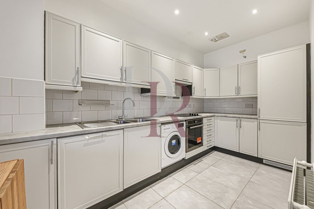 Property photo 2 of 12 Kitchen