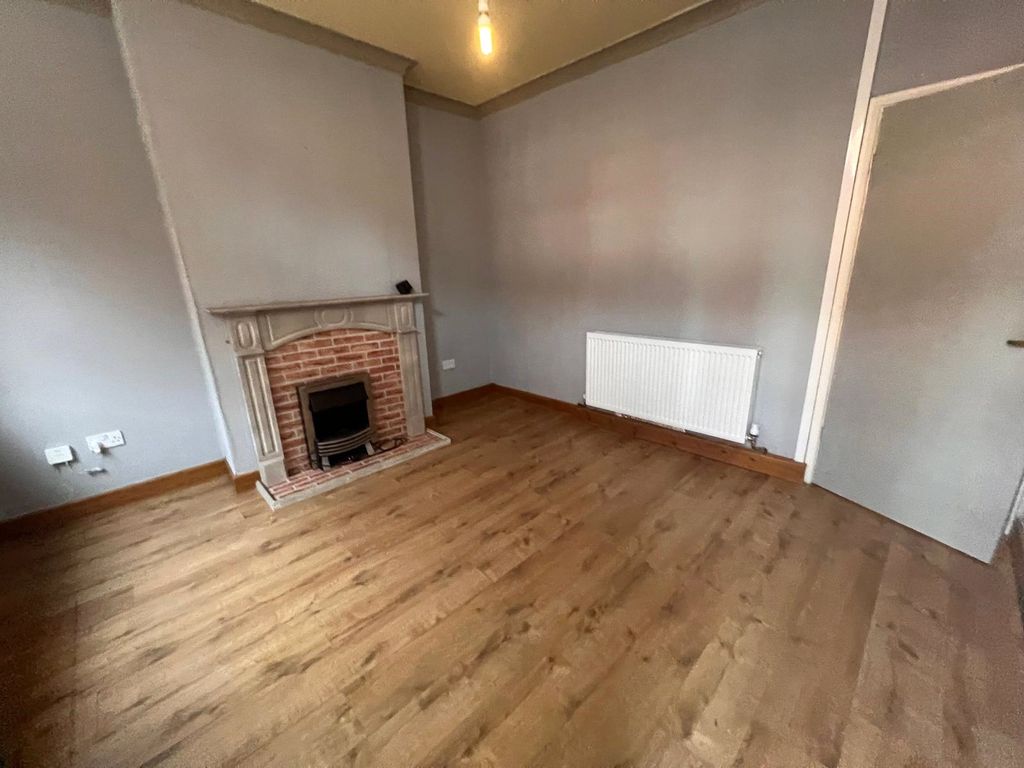 Property photo 2 of 9 Front Living Room