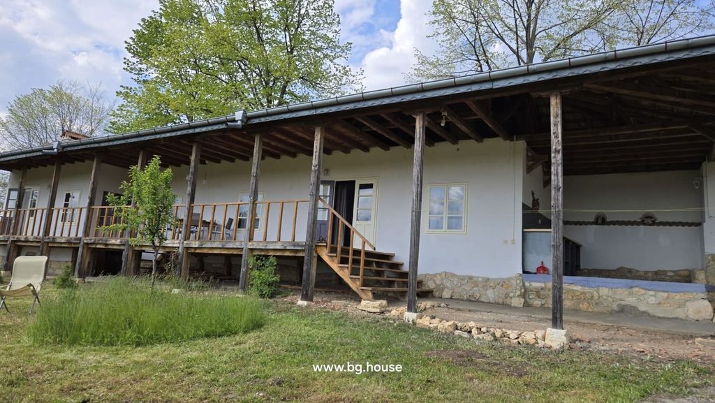 Property photo 1 of 92 Exterior View Of The House Showing A Long Wooden Veranda With Steps Leading To The Garden Area