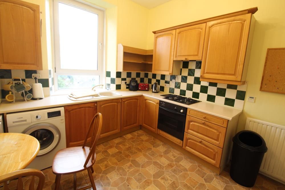 Property photo 3 of 7 Kitchen