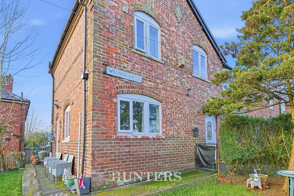 Property photo 1 of 18 Front (Exterior)