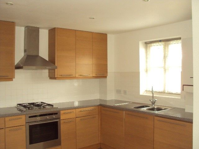 Property photo 3 of 8 Kitchen