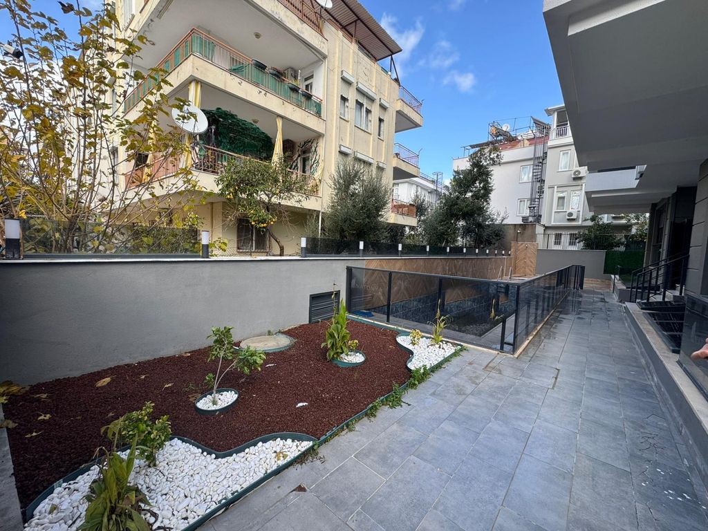 Property photo 3 of 10 Divine Antalya Property For Sale - Landscaped Social Areas