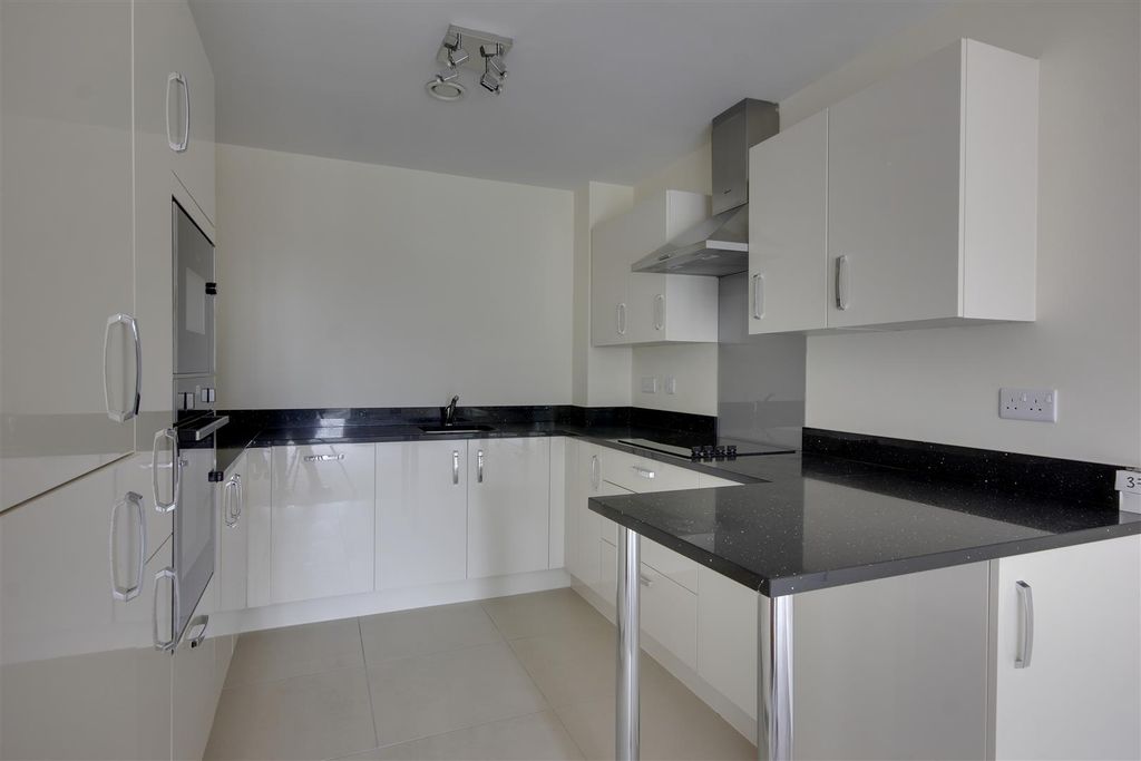Property photo 3 of 8 Kitchen Area