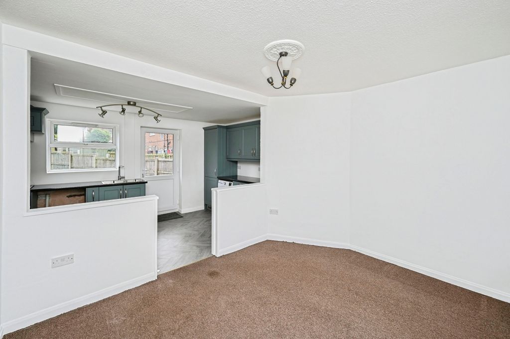 Property photo 3 of 25 Kitchen-Dining Room