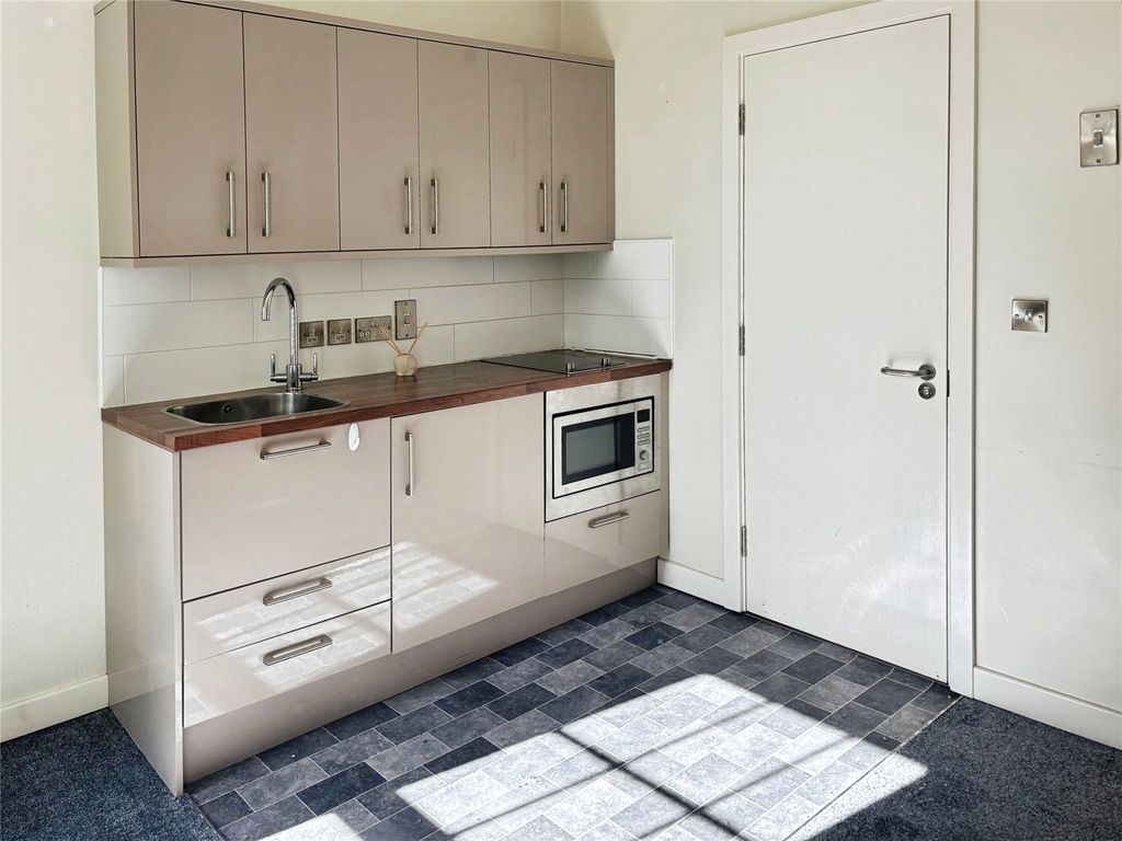 Property photo 2 of 10 Kitchen Area
