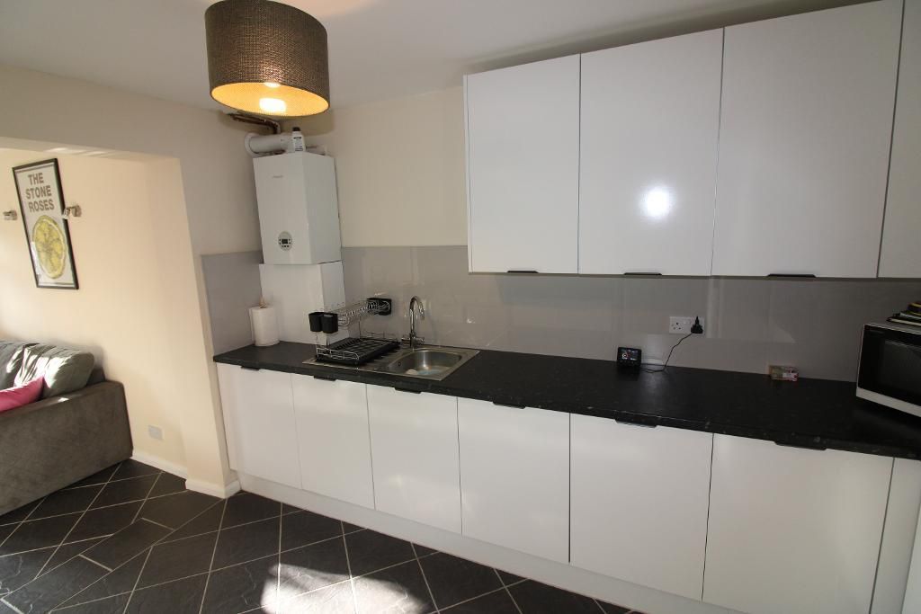 Property photo 3 of 8 Kitchen