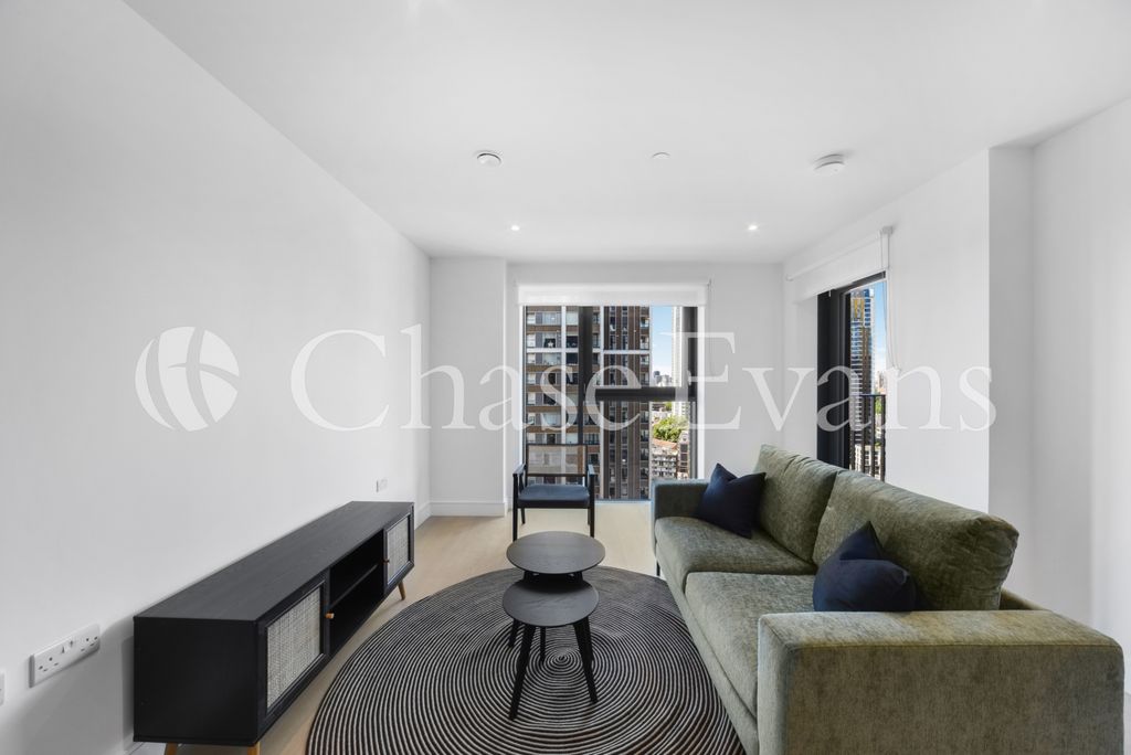 Property photo 3 of 12 Living Area