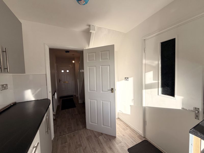 Property photo 3 of 10 Kitchen To Hallway