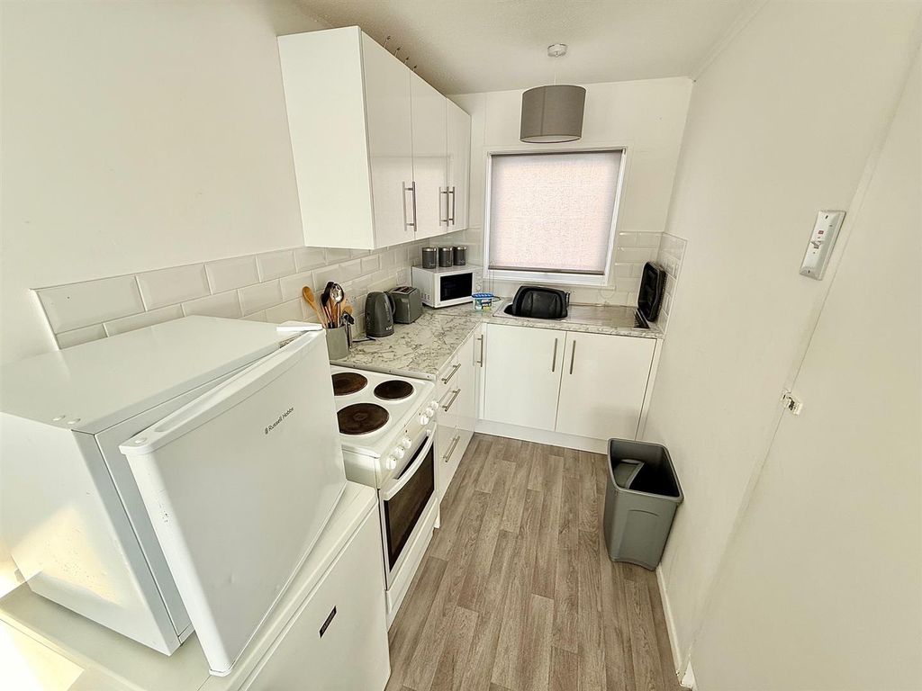 Property photo 3 of 8 Kitchen Area