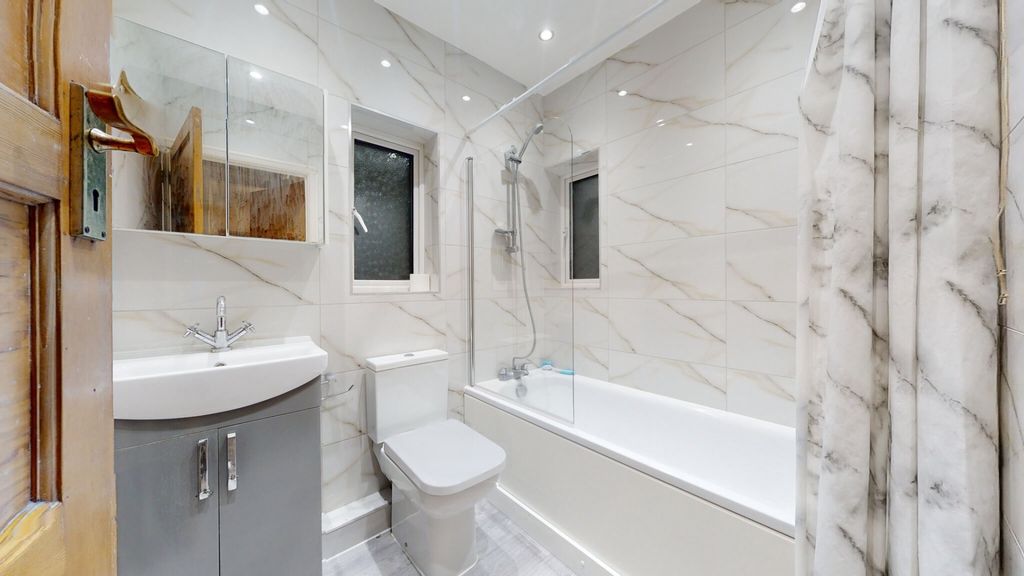Property photo 2 of 6 Modern And Well-Maintained Bathroom With A Spaciou...