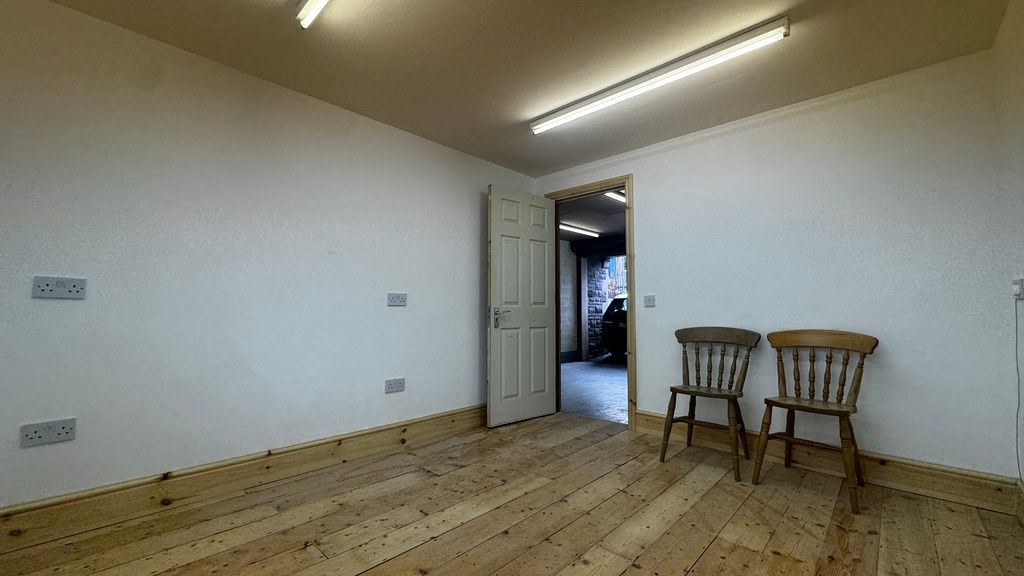 Property photo 1 of 15 Versatile Workspace With Charming Wood Flooring...