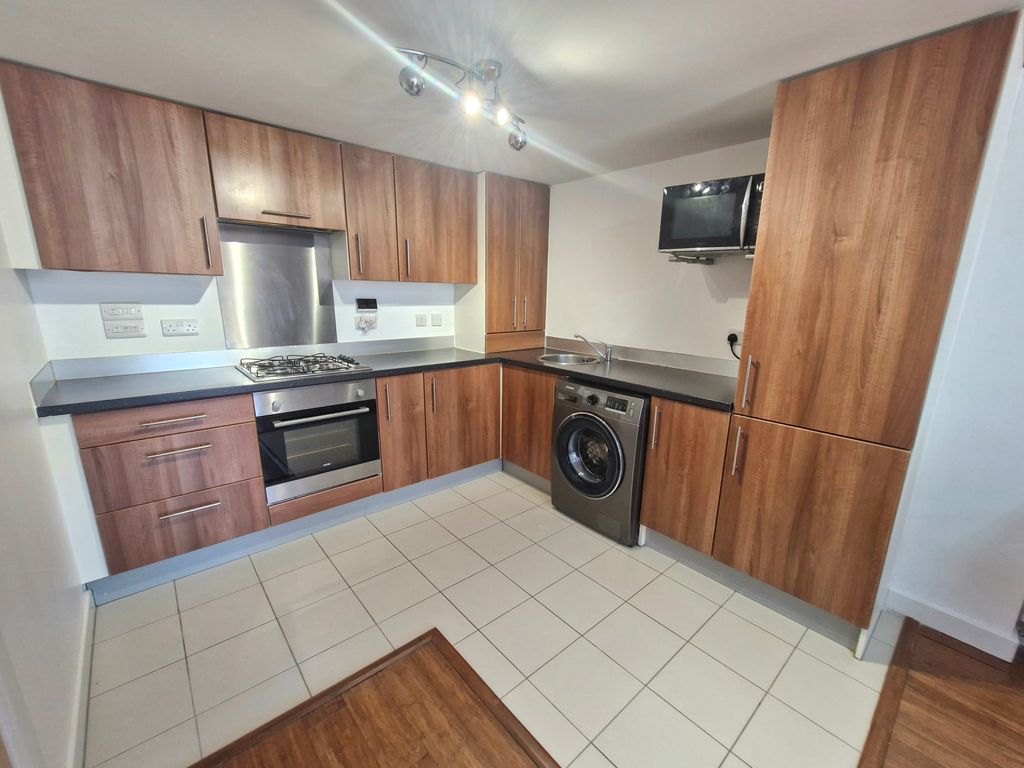 Property photo 3 of 7 Kitchen
