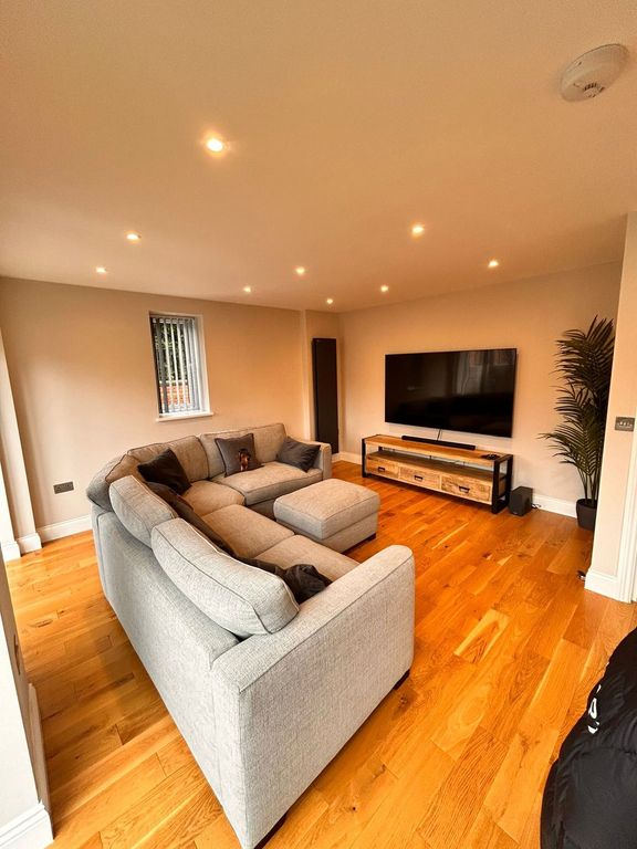 Property photo 1 of 7 Living Area