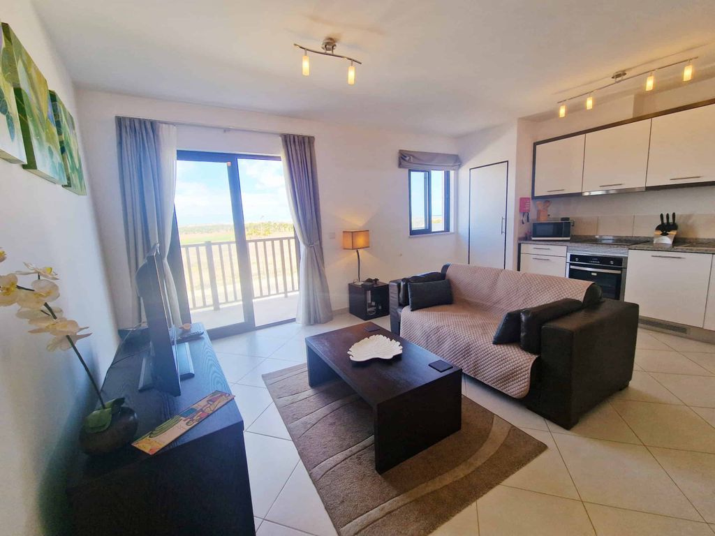 Property photo 3 of 12 Living Area