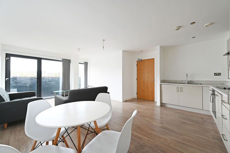 Property photo 1 of 11 Kitchen/Living Area