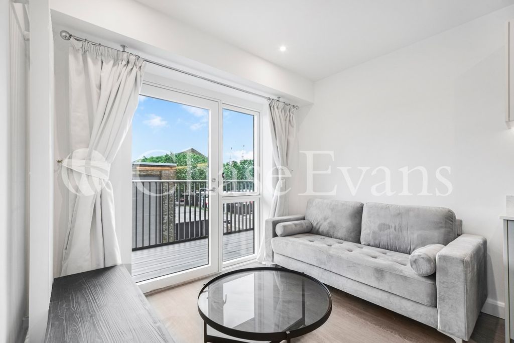 Property photo 3 of 21 Living Area