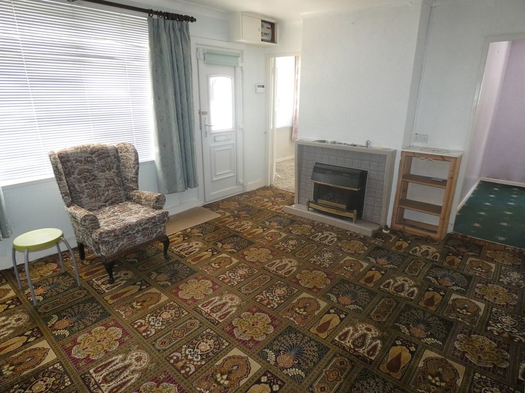 Property photo 2 of 12 Front Lounge