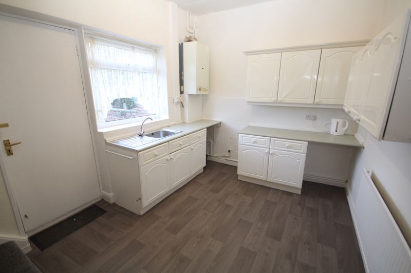 Property photo 3 of 8 Dining Kitchen
