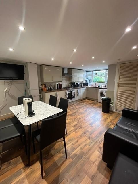 Property photo 2 of 14 Modern Open-Plan Kitchen With Wood-Effect Flooring...