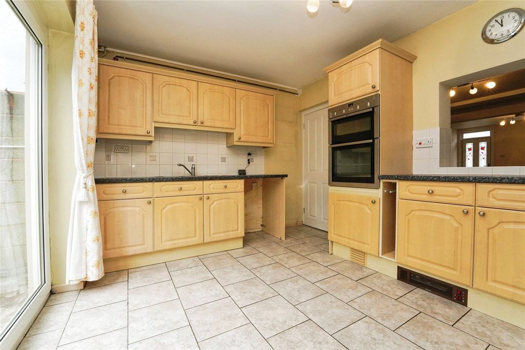 Property photo 2 of 12 Kitchen