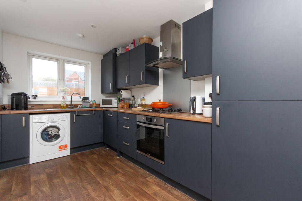 Property photo 2 of 12 Kitchen Area