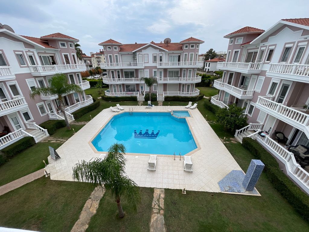 Property photo 1 of 19 Light-Filled Apartment In Belek For Sale - Main View Of Pretty Complex Of Apartments