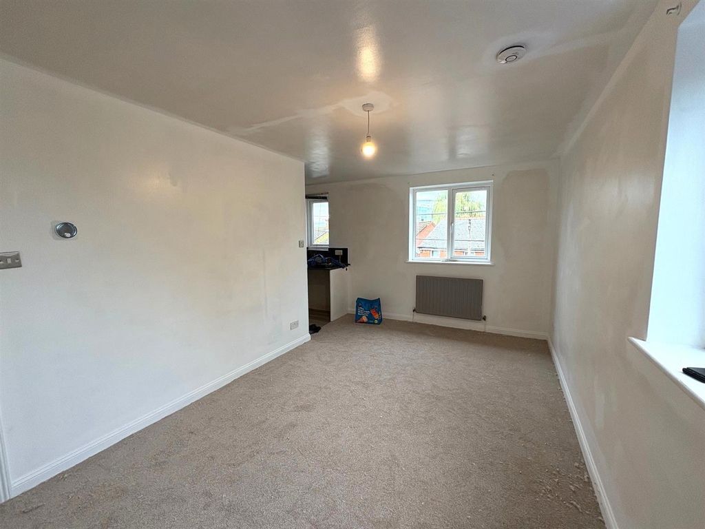 Property photo 2 of 5 Living Area.Jpg