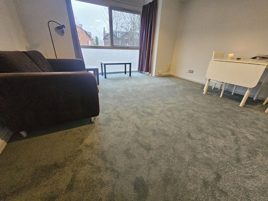 Property photo 2 of 8 Bright Living Area With Wall-To-Wall Carpet, A Com...