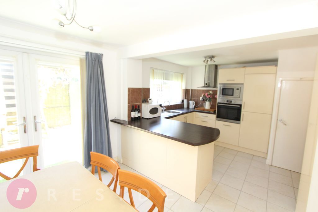Property photo 3 of 12 Dining Kitchen