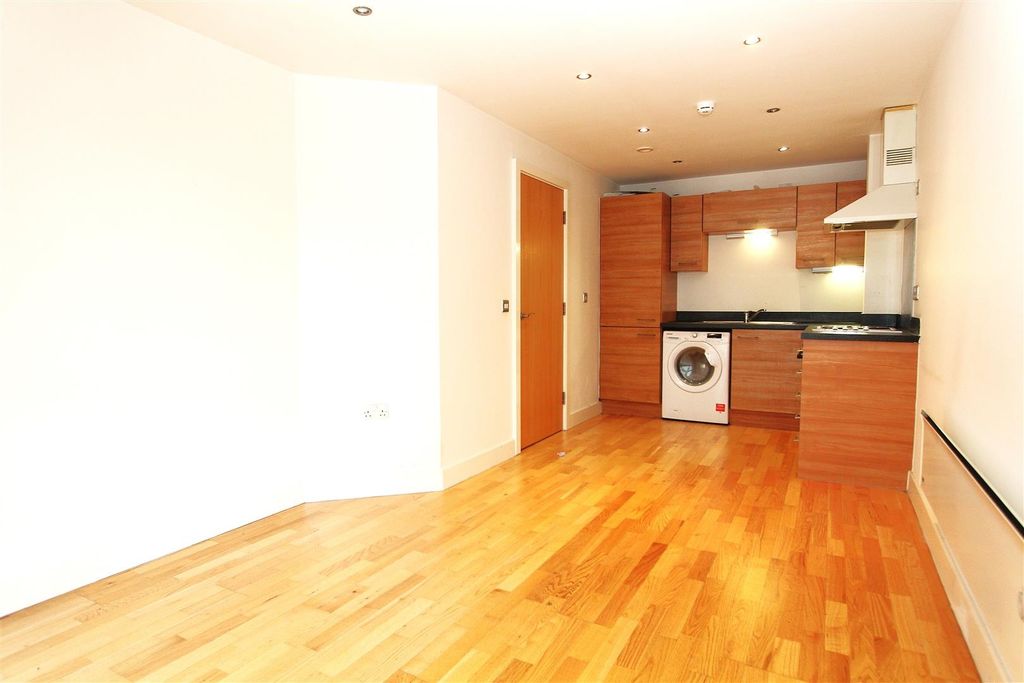 Property photo 1 of 8 Bright Open-Plan Kitchen With Wood Flooring...