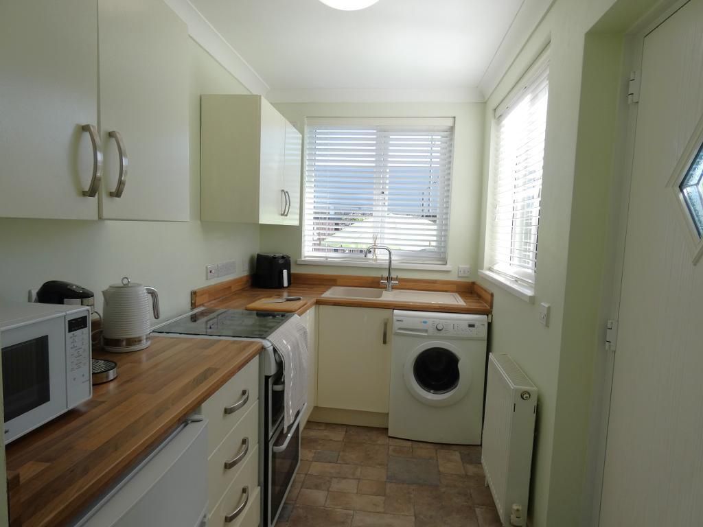 Property photo 3 of 13 Kitchen