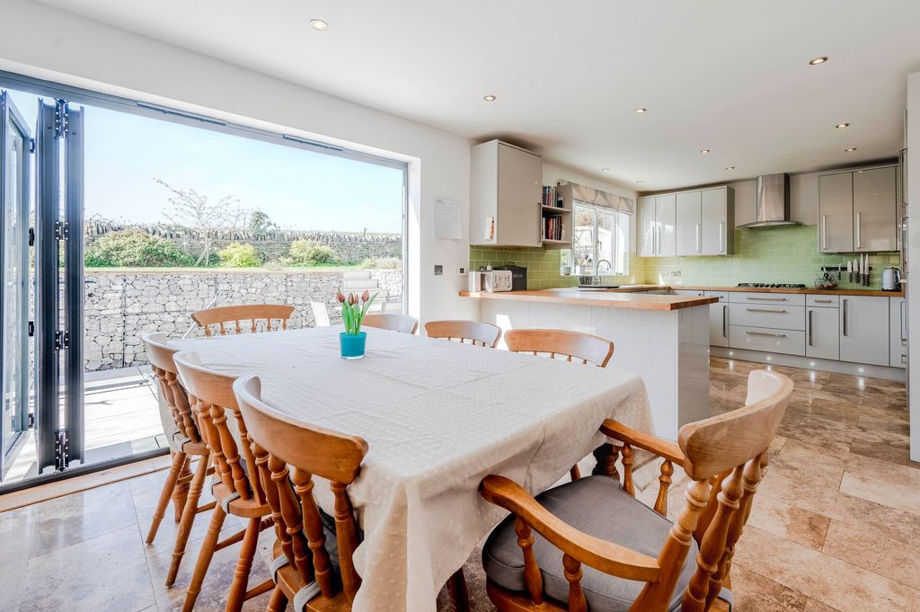 Property photo 2 of 26 Dining Space &amp; Kitchen
