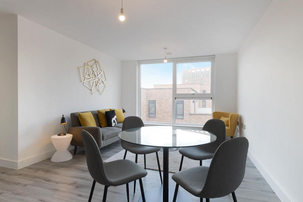 Property photo 3 of 8 Living Area