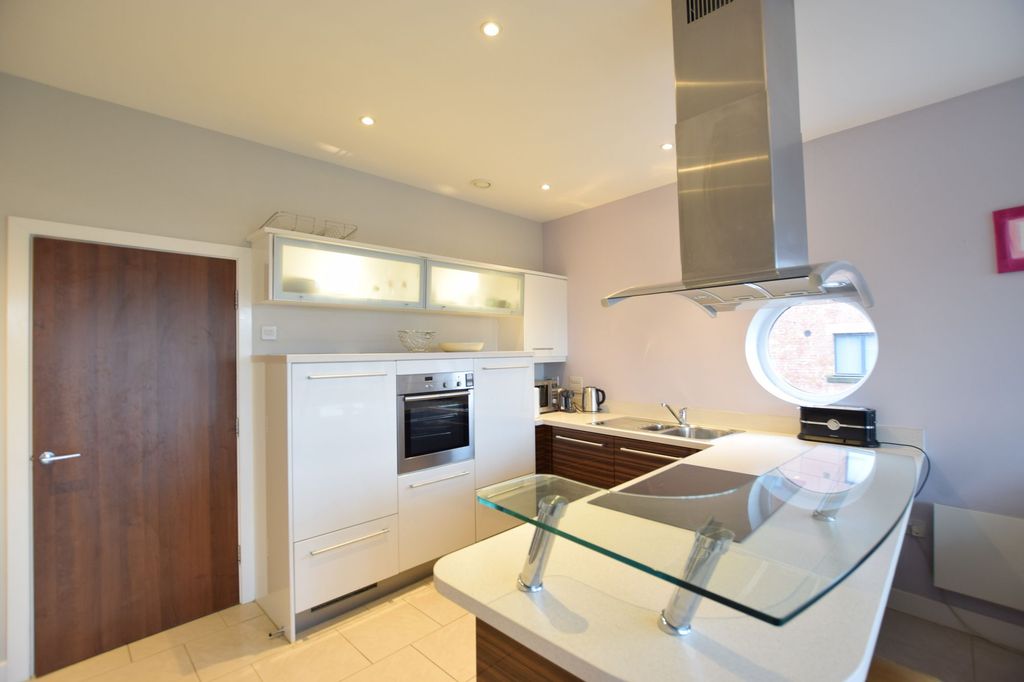 Property photo 2 of 12 Kitchen