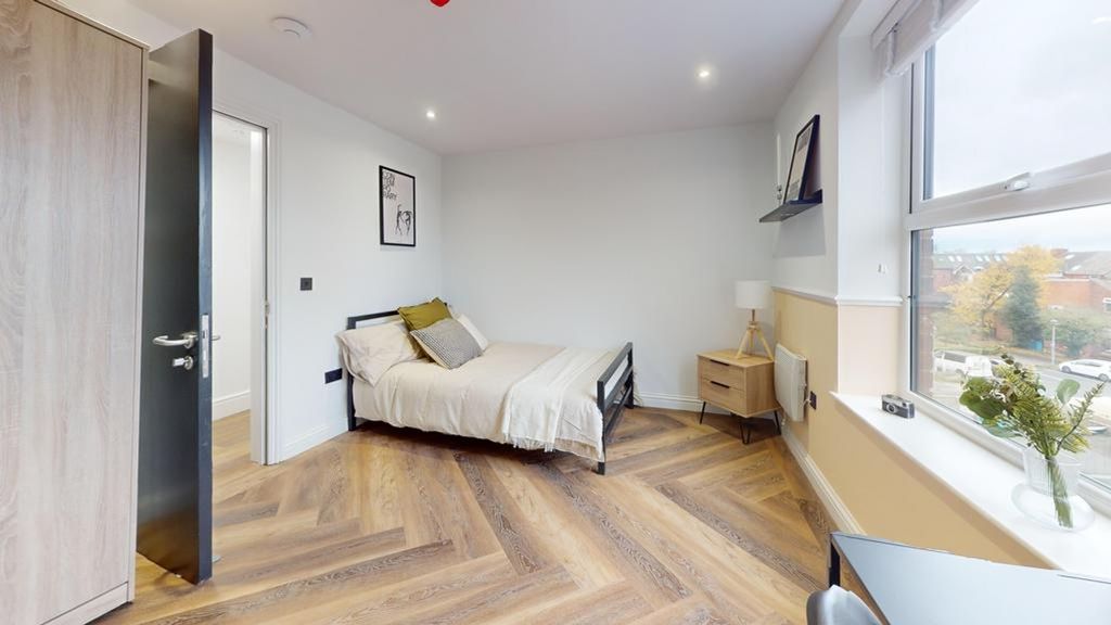 Property photo 3 of 18 A Bright And Inviting Double Bedroom Featuring Mod...
