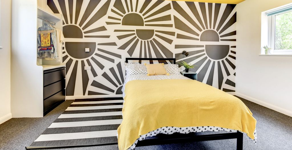 Property photo 3 of 6 This Vibrant Double Bedroom Features A Stylish Des...