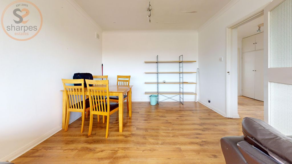 Property photo 2 of 18 240C-Haydons-Road-Living-Room 1