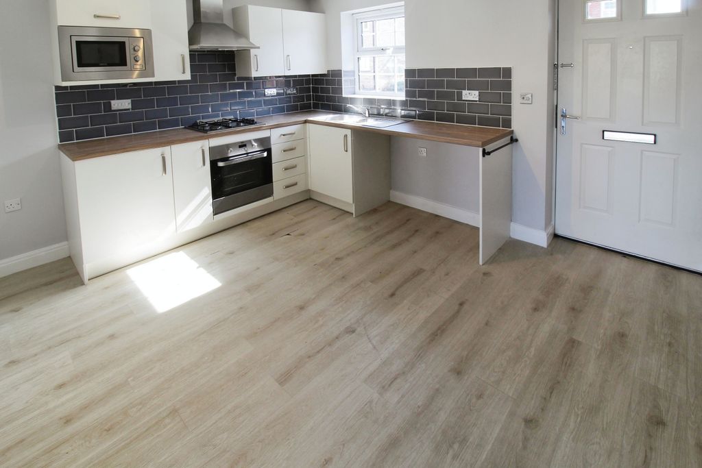 Property photo 2 of 12 Kitchen