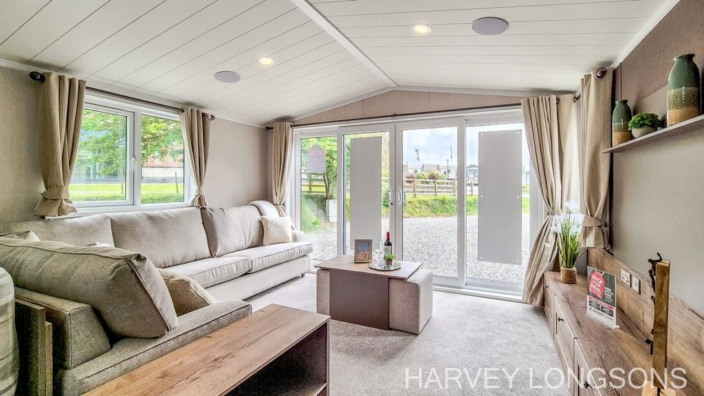 Property photo 2 of 24 Spacious Lounge With French Doors In Swift Faygate At Hedley Wood