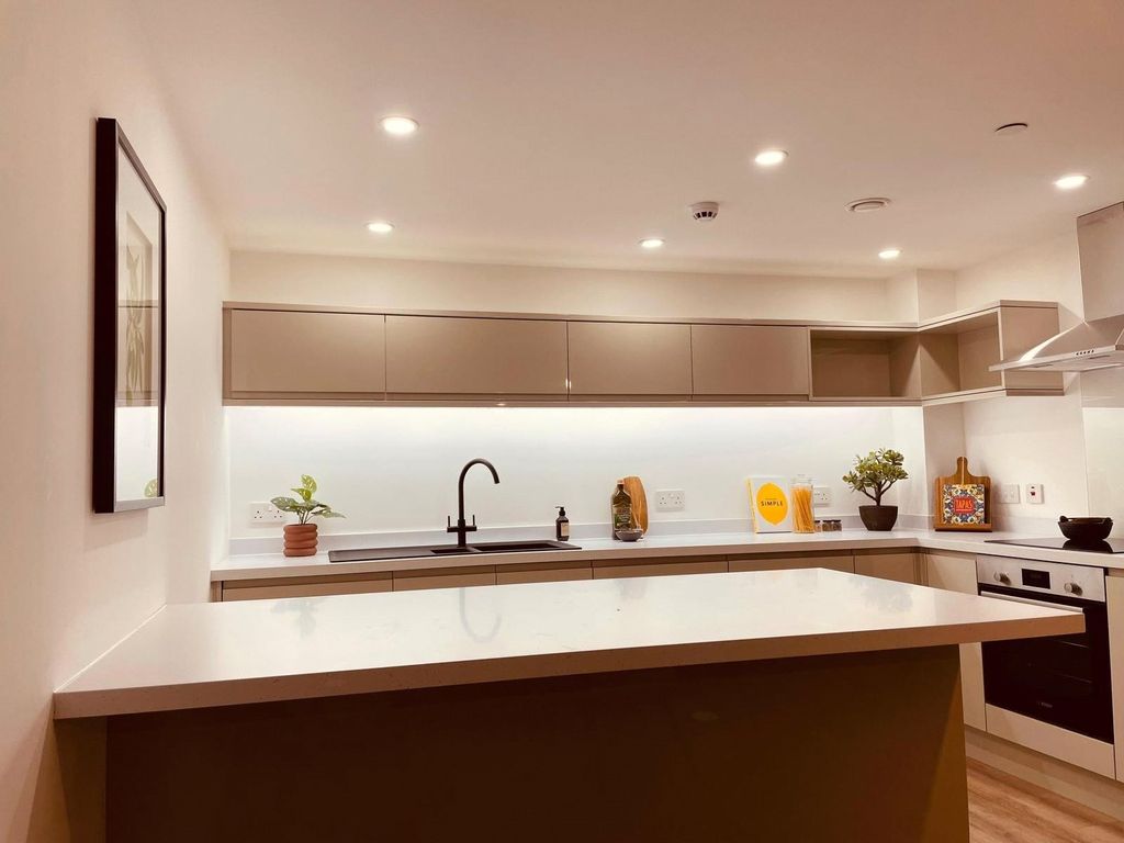 Property photo 2 of 12 Flat 303