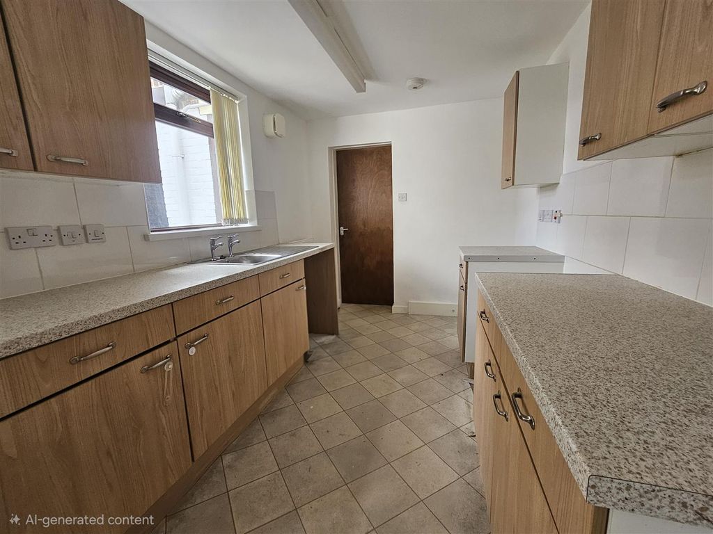 Property photo 1 of 12 Kitchen