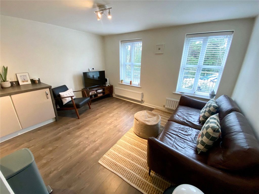 Property photo 2 of 11 Living Area