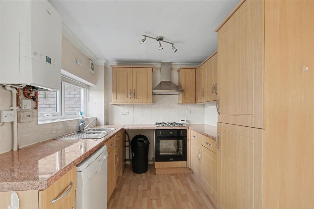 Property photo 3 of 17 Dining Kitchen