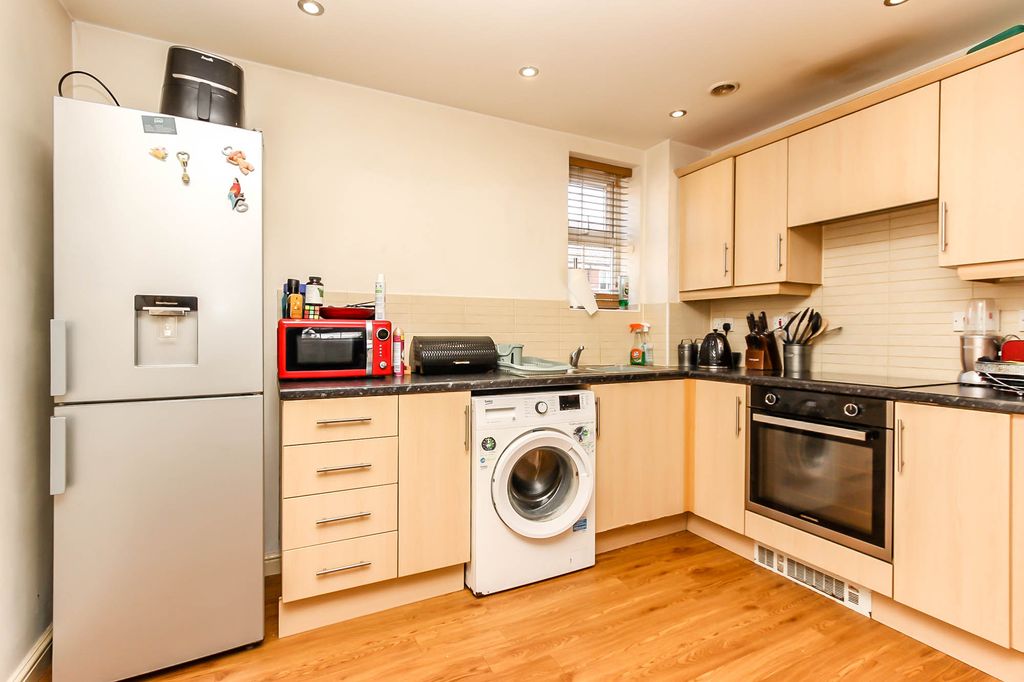 Property photo 3 of 8 Kitchen Area