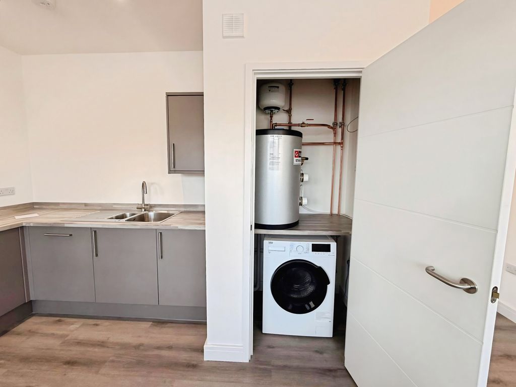 Property photo 3 of 13 Kitchen