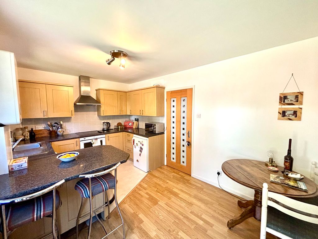 Property photo 3 of 14 Dining Kitchen
