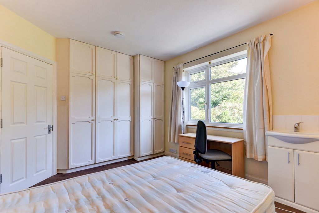 Property photo 2 of 24 A Bright And Welcoming Bedroom With Ample Natural ...