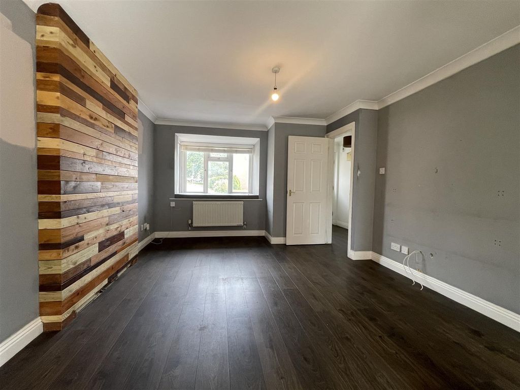 Property photo 3 of 12 Living Room.