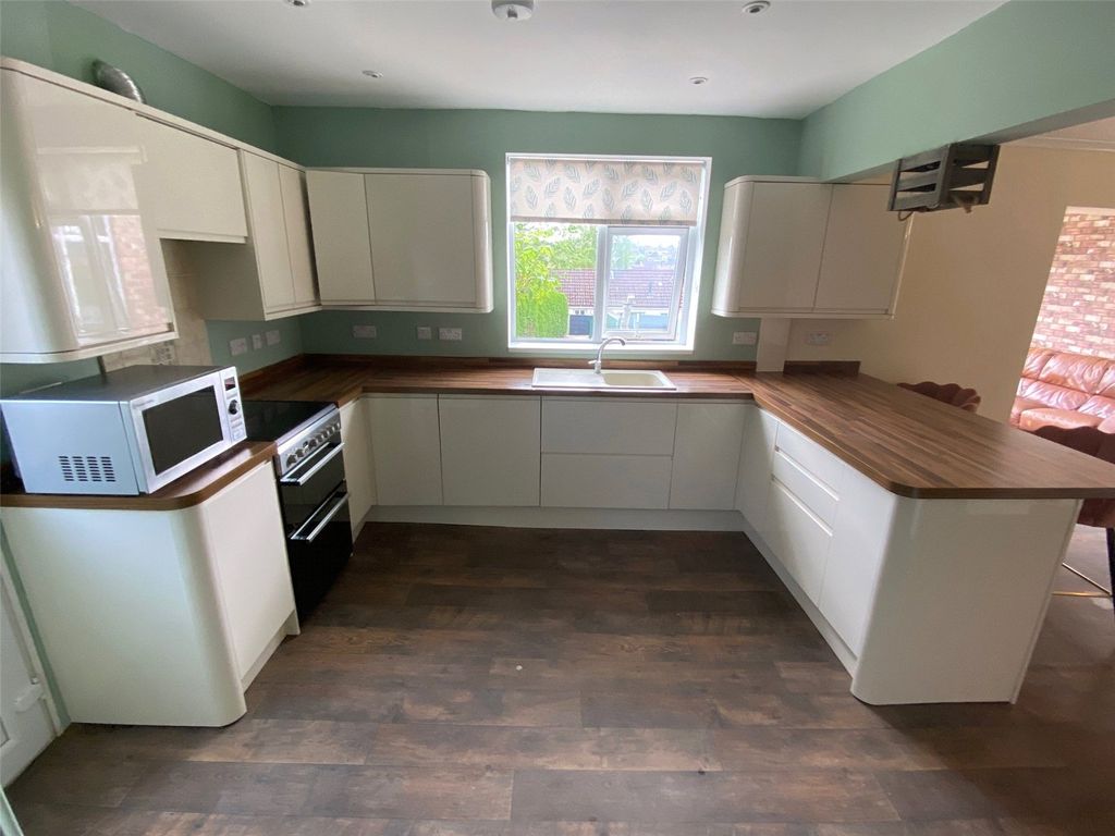 Property photo 2 of 21 Kitchen Area